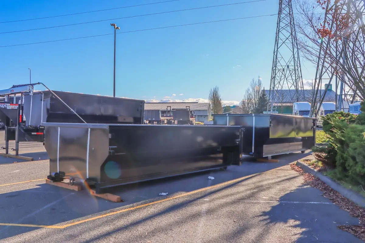 Roll-off dumpster ready for waste disposal at job site for 2 Yard Dumpster Rental in Williston
